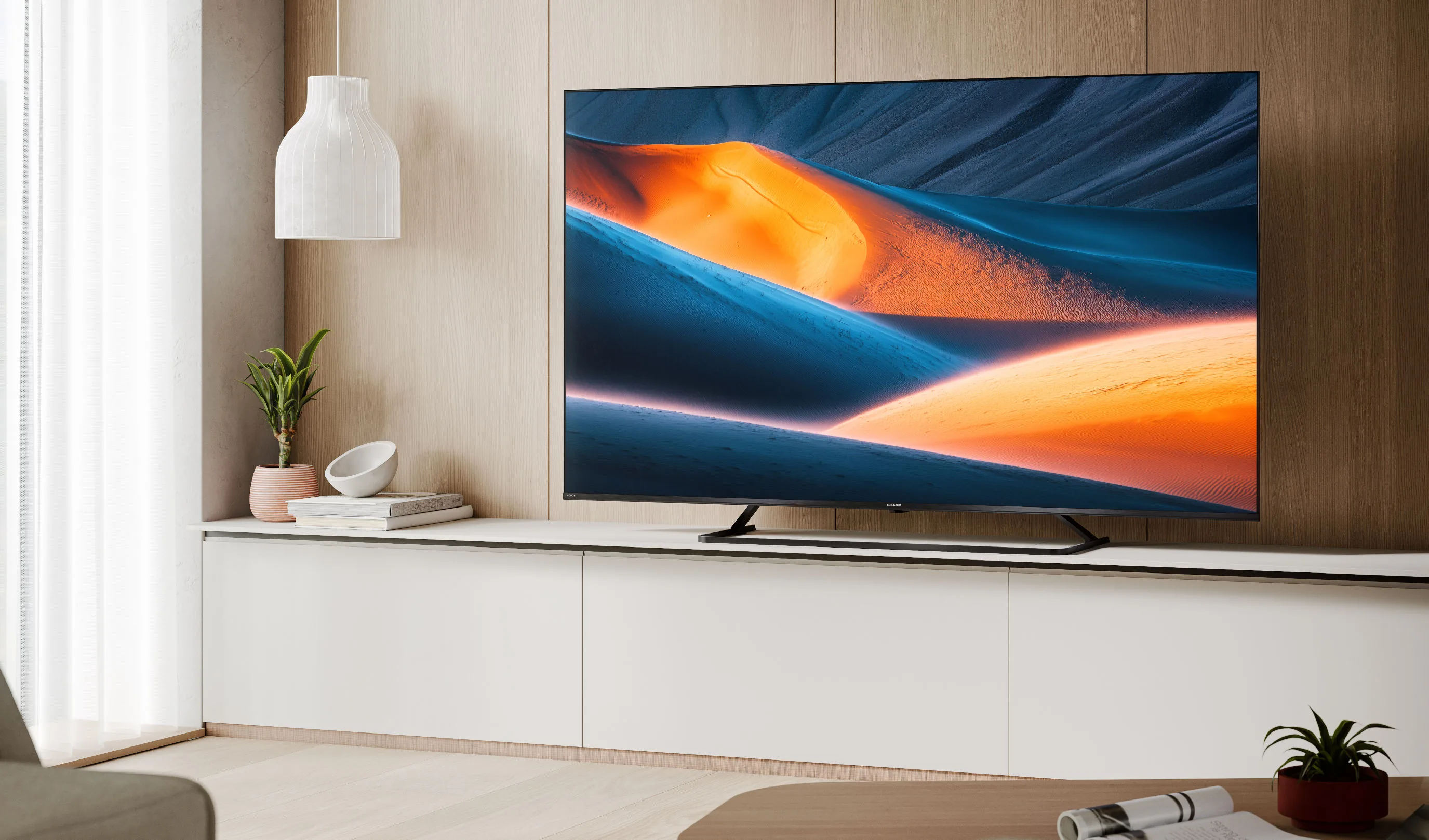 Sharp TV in a modern living room displaying abstract artwork